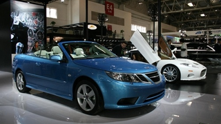 Saab And Spyker Sittin' In Beijing, K-I-S-S-I-N-G...